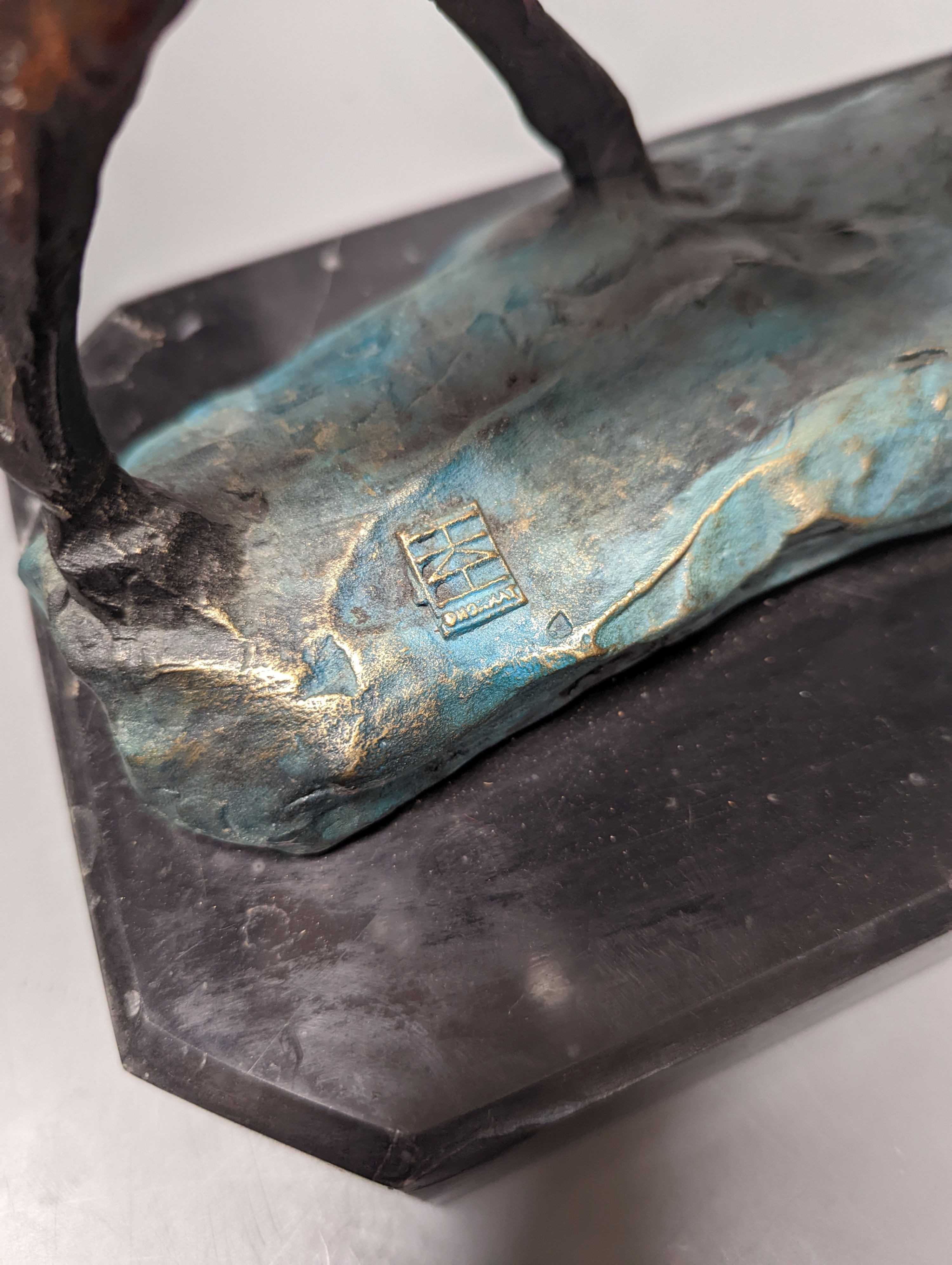 A contemporary cold-painted metal horse on marble base 43cm